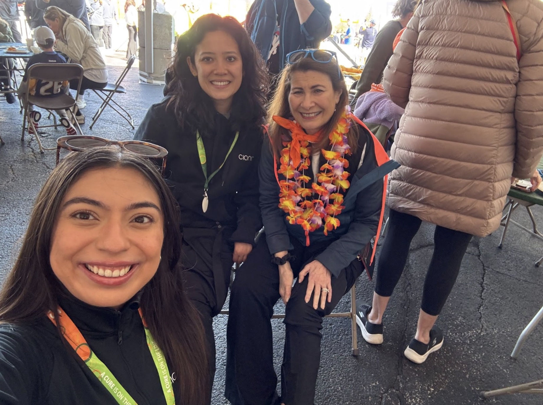 CIONIC team members Maddi (seated, left) and Stephanie with Paula (seated, right) at Walk MS Chicago CIONIC team members Maddi (seated, left) and Stephanie with Paula (seated, right) at Walk MS Chicago